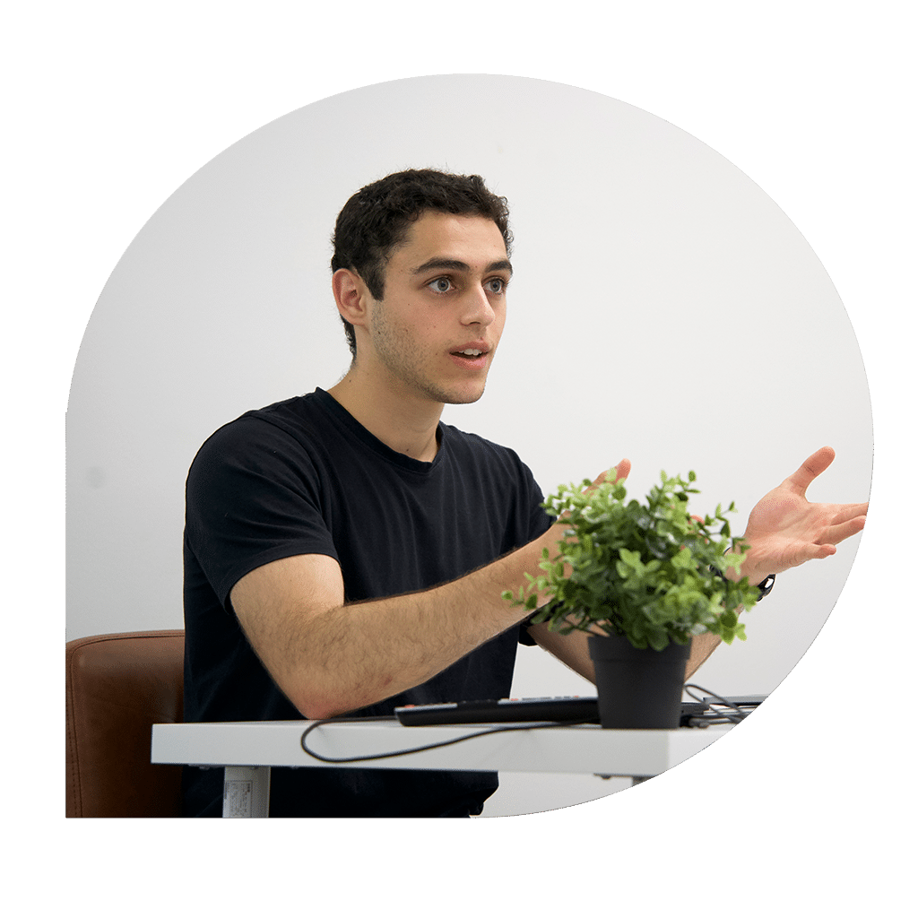 Online & In-Person Year 12 Physics Tutoring Sydney image of a tutor explaining